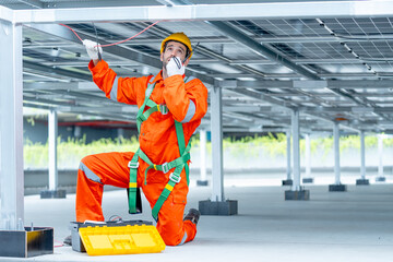 Professional technician worker or engineer use walkie-talkie to contact team during maintenance or...