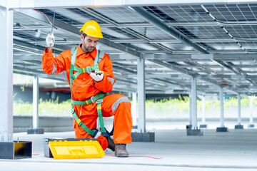Professional technician worker or engineer look at tools for maintenance or check system under...