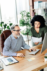 Professional team collaborating in an office environment with focus on strategy and teamwork