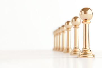 Fototapeta premium Golden spherical bollards in a row, creating an elegant barrier or boundary. Ideal for directing crowds or adding a touch of class to a space.