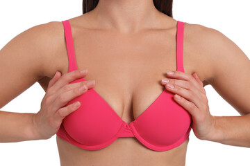Woman wearing beautiful pink bra on white background, closeup