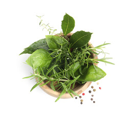 Mortar with different fresh herbs isolated on white, top view