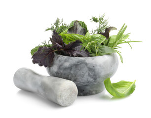 Mortar with different fresh herbs and pestle isolated on white