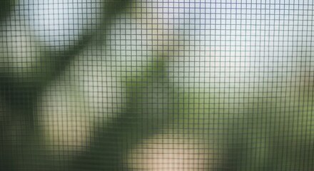 Close up of a screen mesh with blurred background