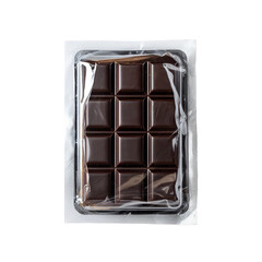Obraz premium Dark Chocolate Delight: An enticing overhead shot of a rich, dark chocolate bar, neatly packaged, promising a moment of pure indulgence.