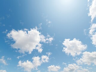 Gentle white clouds drift across an expansive pale blue sky, promising fair weather and calm, a backdrop of serenity above the world