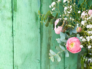 spring flowers on wooden background - greeting card for mothers day, easter and wedding
