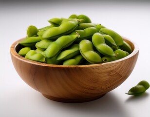 a wooden bowl filled with fresh green edamame pods showcasing their vibrant color and natural texture white background