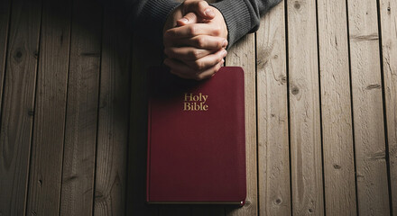 Man holding a red wooden door and a wooden sign in a business concept