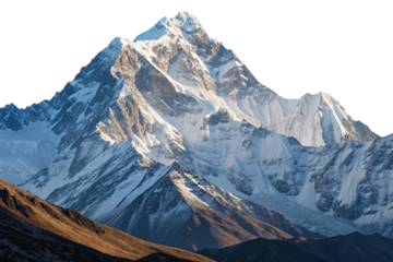 Majestic snow capped mountain peak illuminated by golden hour sunlight isolated on transparent background