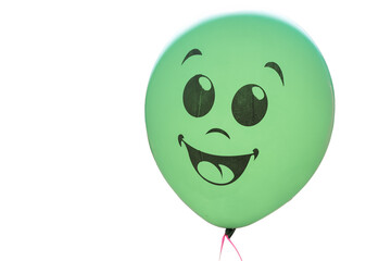 Cheerful green balloon with smiling face hovering weightlessly, floating against clear background,...