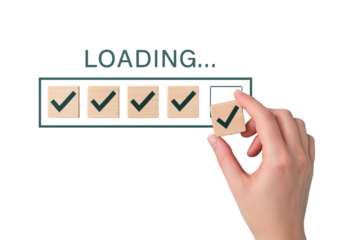 Hand placing final wooden cube with checkmark on transparent loading bar, signaling project completion, goal achievement, task fulfillment