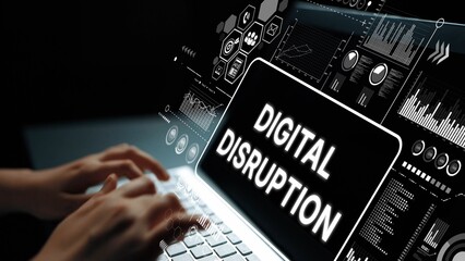 Hands Typing on a Laptop with Digital Disruption Concept and Data Visualizations in a Dark...