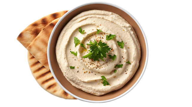Creamy hummus bowl with pita bread and fresh parsley garnish isolated on transparent background - Powered by Adobe