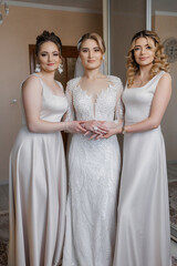 Bridesmaid preparation in cozy indoor setting before the wedding ceremony in autumn