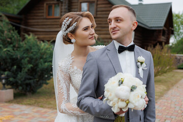 Couple celebrates their wedding at a picturesque outdoor venue surrounded by nature