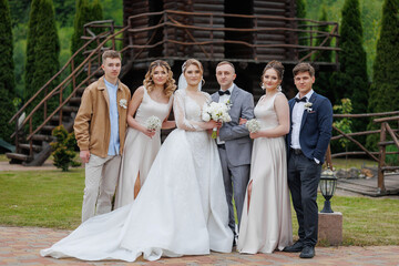 Celebration of love with a wedding party in a scenic outdoor setting in springtime