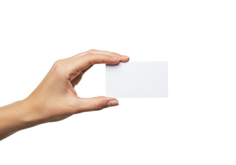 Fototapeta premium A well-manicured young caucasian woman's hand with light polish holding a blank white business card, extended forward against a clean, seamless transparent background with ample copy space, concept of