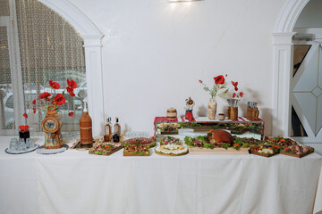 Festive buffet spread featuring gourmet dishes and elegant decor at a celebration event