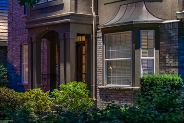 Entrance of luxury house with nice spring blossom landscape at night in Vancouver, Canada, North...