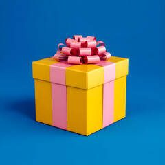 A yellow box with pink ribbon on top of it