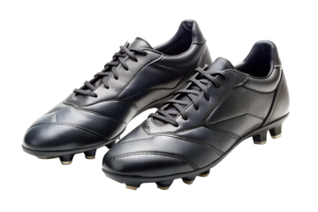 A pair of black leather soccer shoes isolated on transparent background are ready for the game