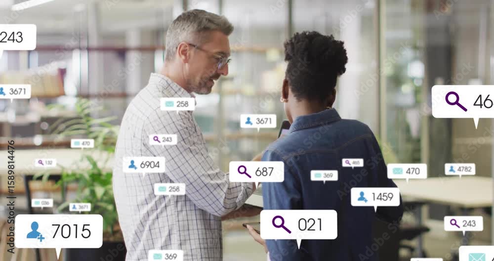 Poster man pointing tablet and activating floating search, user icons while mentoring analytics colleague