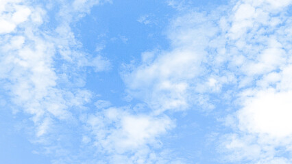 Clear blue sky with soft cloud with daylight natural background. Soft white clouds float in the clear blue sky. Clear blue sky, bright spring, soft sky gradient.