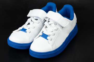 Stylish white and blue sneakers designed for everyday comfort and fashion