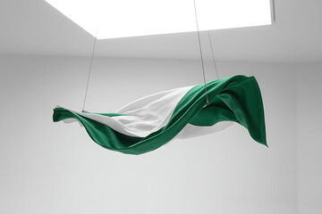 A draped fabric of green and white elegantly hangs, creating a sense of motion and modern style with subtle textures and a minimalist background.