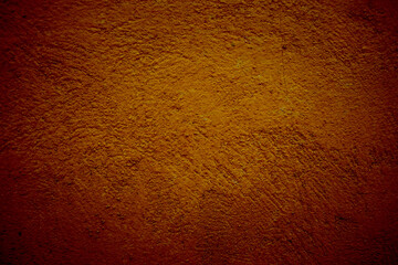 Brown textured wall background with abstract plaster pattern and rough brown putty