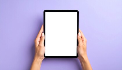 Hands holding a tablet with a blank screen