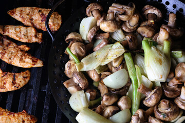 Close-Up of Grilled Chicken and Vegetables on a Barbecue Grill