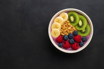 Healthy smoothie bowl with fruits breakfast food photography concept