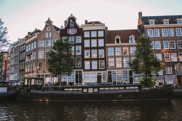 Amsterdam canal houses with a boat