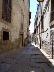 Narrow street in the Medieval old town of Viterbo. Viterbo, Lazio region, Italy