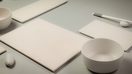 white cup and coffee cup