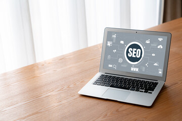 SEO search engine optimization for modish e-commerce and online retail business showing on computer...