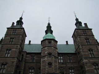 Fototapeta premium Towers of the Rosenborg Castle (Rosenborg Slot) in Copenhagen, Denmark