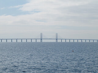 Obraz premium Øresund Bridge (Øresundsbroen) between Denmark and Sweden seen from Malmö, Sweden