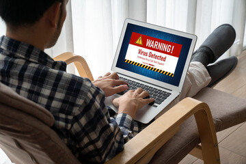 Virus warning alert on computer screen detected modish cyber threat , hacker, computer virus and...