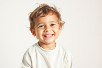 Joyful Toddler's Portrait Against White Background