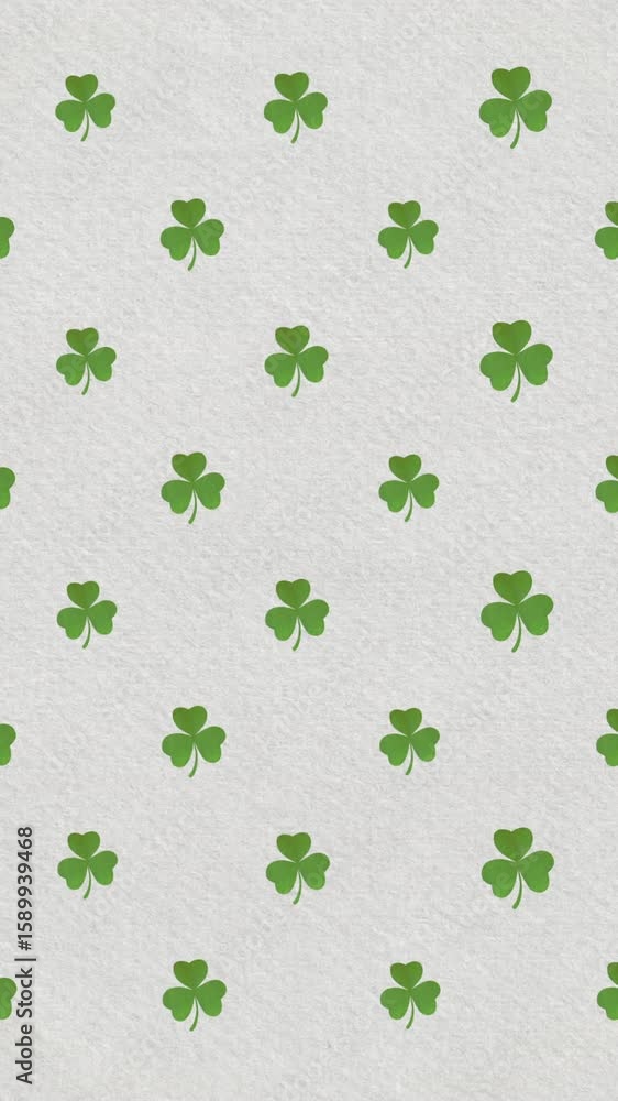 Poster digital animation of multiple clover leaves moving against irish flag