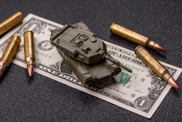 Money, cash dollars to fund weapons for war and defense against attack. Dollars for war