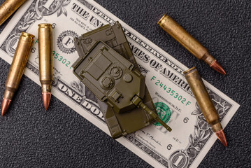 Money, cash dollars to fund weapons for war and defense against attack. Dollars for war