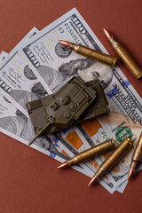 Money, cash dollars to fund weapons for war and defense against attack. Dollars for war
