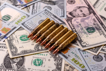 Money, cash dollars to fund weapons for war and defense against attack. Dollars for war