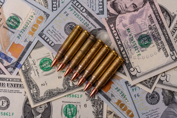 Money, cash dollars to fund weapons for war and defense against attack. Dollars for war