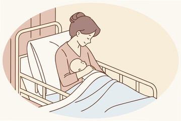 Newborn baby being breastfed by mother in a hospital bed, moments after birth—emotional and intimate bonding scene.