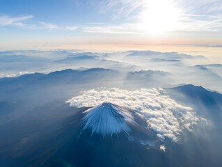 Aerial view of mount fuji japan covered in clouds and snow scenic landscape photo